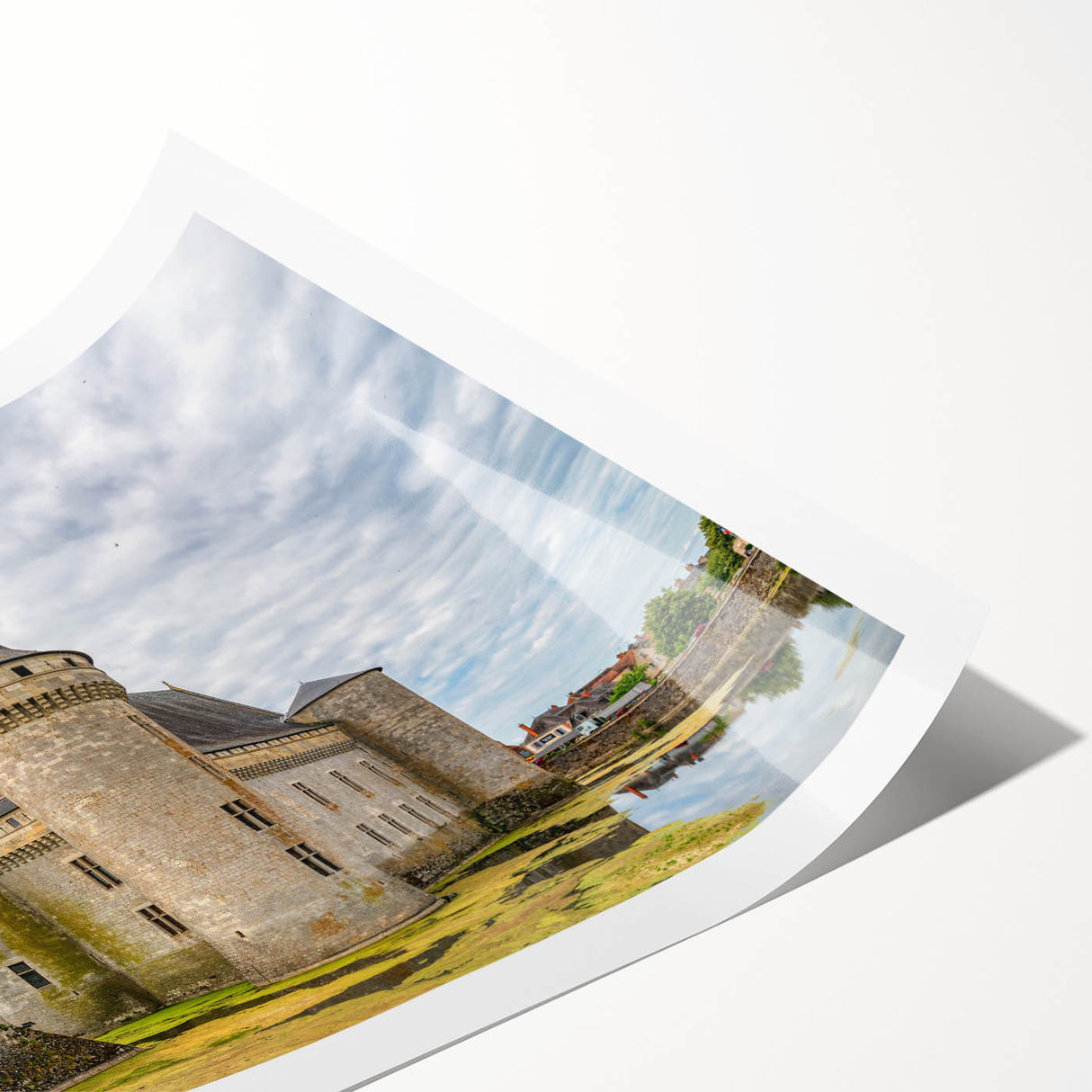 Colorful landscape wall art print showcasing a majestic castle surrounded by lush greenery, ideal for home decor. Rolled for easy display and shipping.