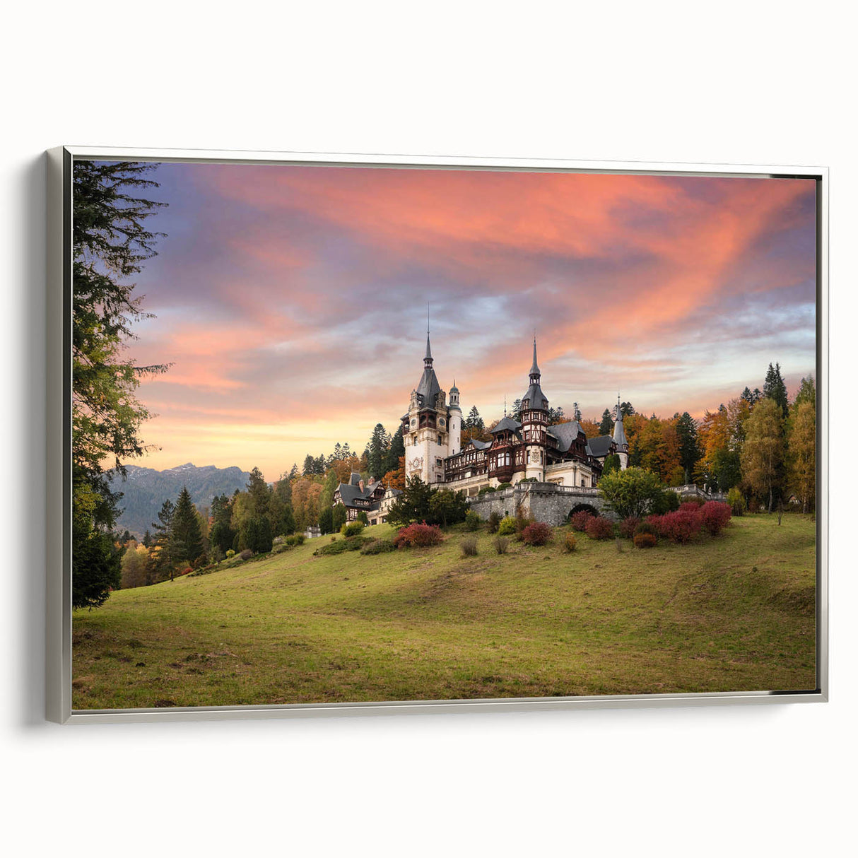 Framed canvas artwork showcasing a stunning landscape and castle design, with a silver frame and elegant side view, perfect for home decor and art enthusiasts.