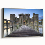 Framed canvas wall art collection showcasing a majestic castle landscape with silver accents, set against a neutral wall, perfect for enhancing home decor.