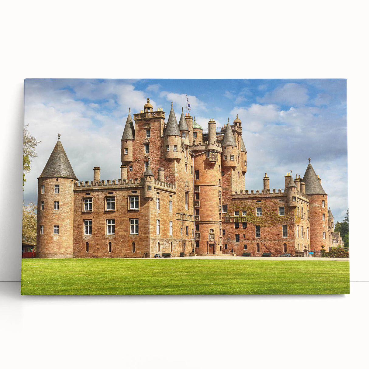 Stretched canvas wall art featuring a scenic landscape with a majestic castle, showcasing vibrant colors and intricate details, perfect for home decor enhancement.