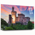 Acrylic glass wall art collection showcasing a vibrant landscape with a castle, displayed from a side view, elegantly pinned for a modern aesthetic.