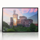 Framed acrylic wall art featuring a stunning castle landscape design, presented in a sleek black frame, ideal for enhancing home decor with a touch of elegance.