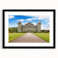 Framed wall art collection showcasing a stunning landscape and castle design, featuring a sleek black frame and matting, perfect for enhancing home decor.