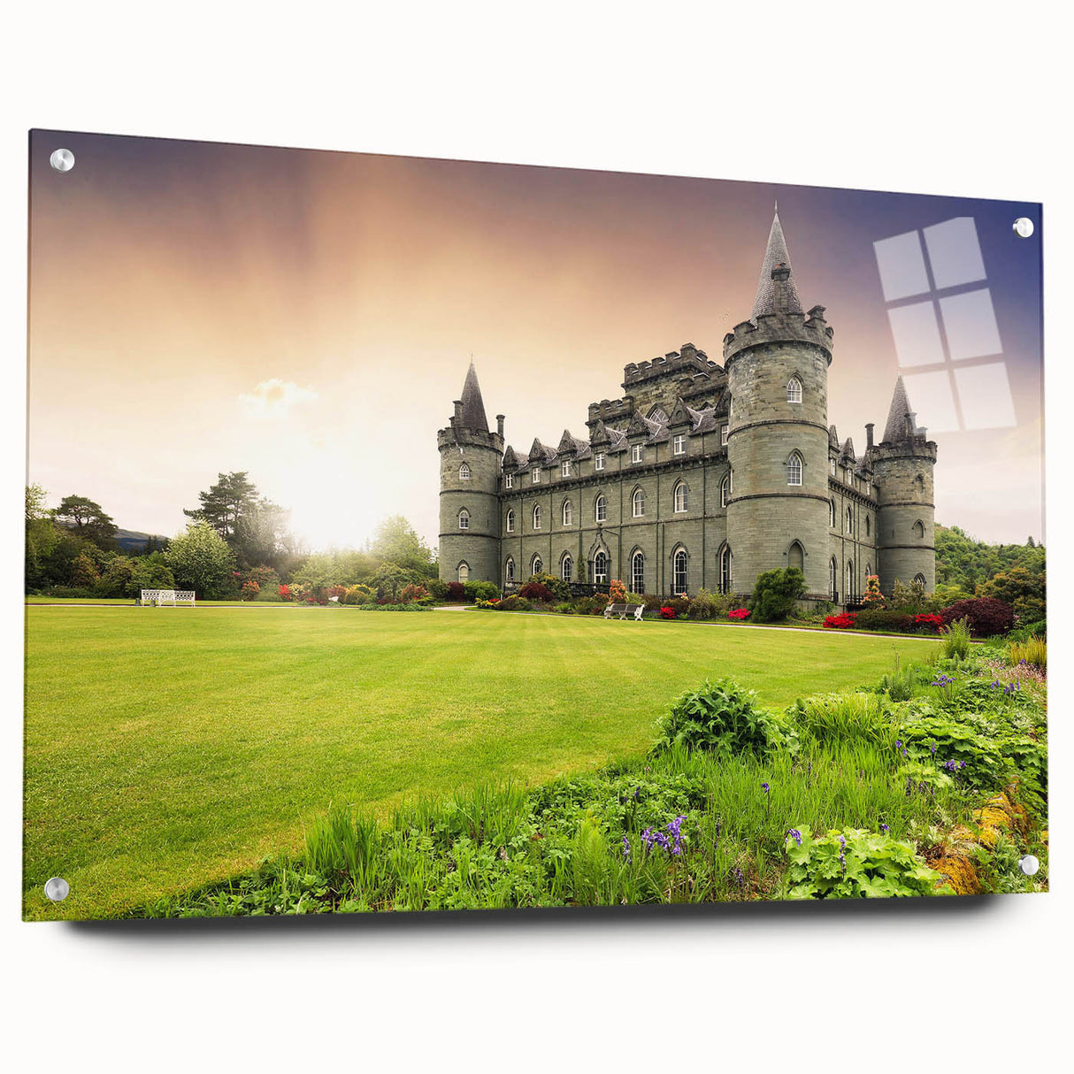 Acrylic glass wall art featuring a scenic landscape of a majestic castle, designed for modern decor, displayed in a side view with decorative pins holding it in place.