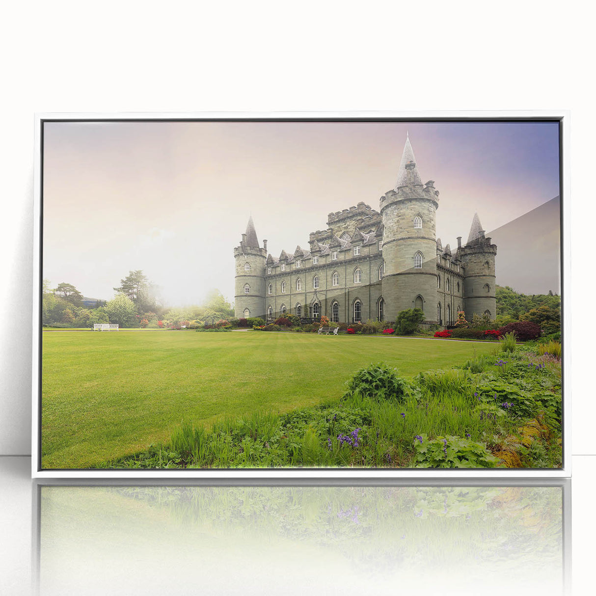 Framed wall art collection featuring a stunning landscape design with a castle, displayed in a sleek white frame, ideal for enhancing home decor aesthetics.