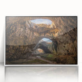 Framed wall art featuring a stunning cave landscape design with vibrant colors, set in a sleek white frame, perfect for home decor and enhancing interior spaces.
