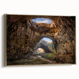 Framed canvas wall art showcasing a stunning landscape with caves, featuring gold accents and a modern design. Ideal for adding elegance to any decor.