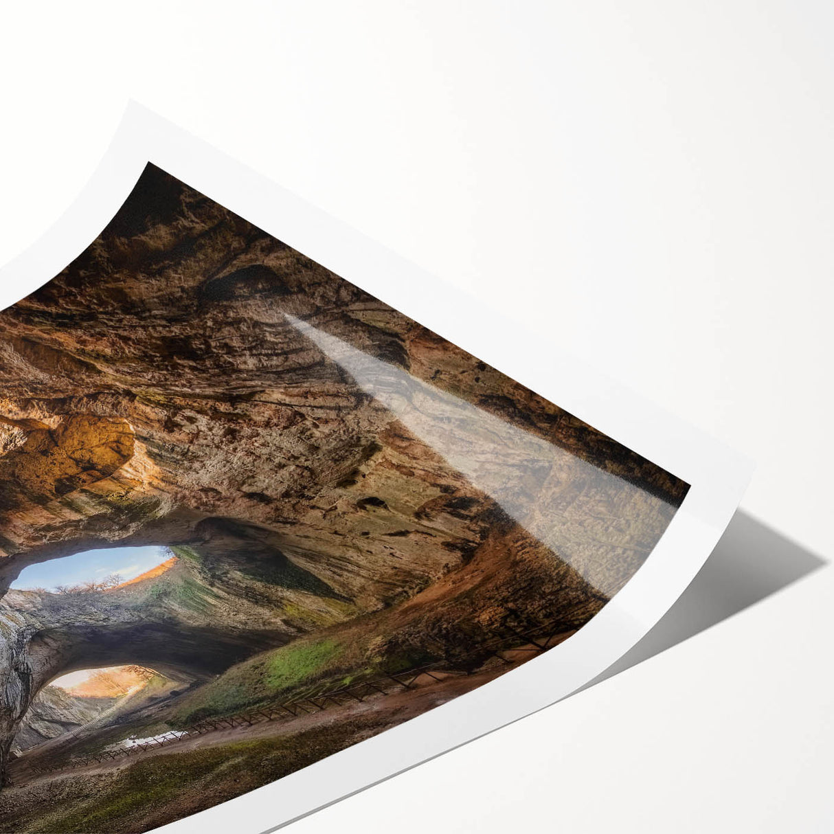 Vibrant rolled print showcasing an abstract cave landscape design in earthy tones, perfect for modern wall decor. Packaged securely in a durable cardboard tube for safe delivery.