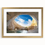 Framed wall art print showcasing a stunning cave landscape design with a luxurious gold frame and matting, perfect for enhancing modern home decor.