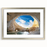 Framed wall art featuring a stunning landscapes and caves design, presented in a sleek silver frame with a white mat, ideal for home décor enhancement.