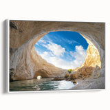 Framed canvas wall art showcasing a vibrant landscape design featuring caves, with a sleek white frame, perfect for modern home decor. Ideal for adding a touch of nature to living spaces.