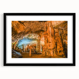 Framed black wall art featuring a stunning landscape cave design, with a white mat enhancing the artwork's depth, perfect for modern home decor.