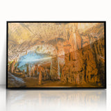 Framed acrylic wall art showcasing a stunning landscape cave design, featuring rich earthy tones and intricate details, ideal for modern home decor.