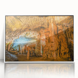 Framed acrylic wall art featuring a stunning landscape design with intricate cave formations, presented in a sleek white frame, perfect for enhancing modern decor.