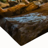 Close-up of a stretched canvas showcasing a vibrant landscape cave design, featuring rich colors and intricate details, perfect for modern home decor.