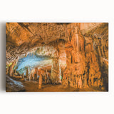 Stretched canvas artwork showcasing an intricate landscape of caves, featuring earthy tones and textures, perfect for enhancing home decor with natural beauty.