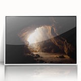 Framed wall art featuring a modern landscape design with caves, presented in an elegant white frame. The acrylic finish enhances colors and details, perfect for contemporary decor.