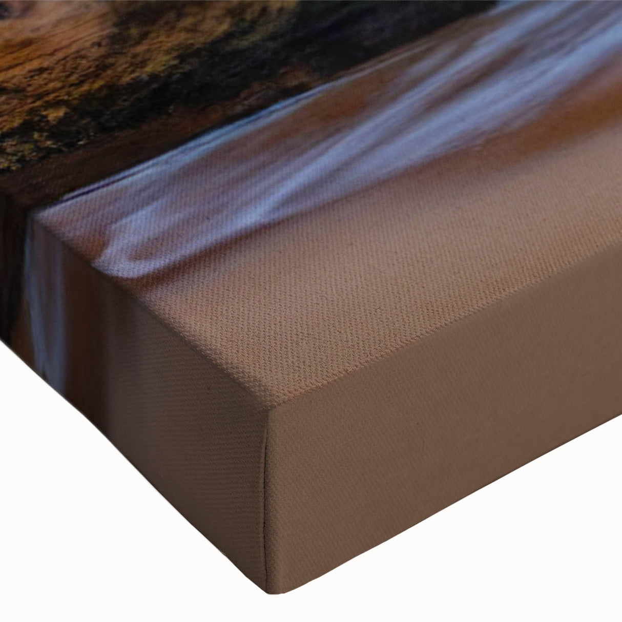 Close-up of a stretched canvas featuring a vibrant cave landscape design in earthy tones, ideal for home decor, showcasing intricate details and textures.