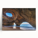 Stretched canvas wall art showcasing a vibrant cave landscape design in earthy tones, perfect for adding a natural touch to home decor. This piece leans against a neutral background, enhancing its artistic appeal and inviting ambiance.