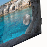 Close-up view of a vibrant acrylic glass wall art piece showcasing a stunning landscape design with intricate cave formations and rich color gradients, ideal for modern home decor.