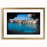 Framed wall art collection showcasing a stunning landscape design featuring intricate cave formations, accented with a gold frame and mat, ideal for home decor.