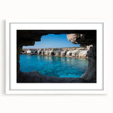 Framed wall art collection showcasing stunning landscape and cave designs, featuring a white mat and sleek frame, perfect for home decor enhancement.