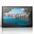 Framed acrylic wall art featuring a stunning landscape design of caves, presented in a sleek black frame, perfect for enhancing modern decor in any room.