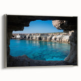 Framed canvas wall art showcasing a stunning landscape with cave designs in earthy tones, featuring a sleek silver frame, perfect for modern home decor.