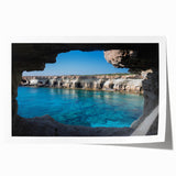 Rolled print showcasing a vibrant landscape design featuring intricate cave formations and rich colors, ideal for home decor or art collection, packaged securely.