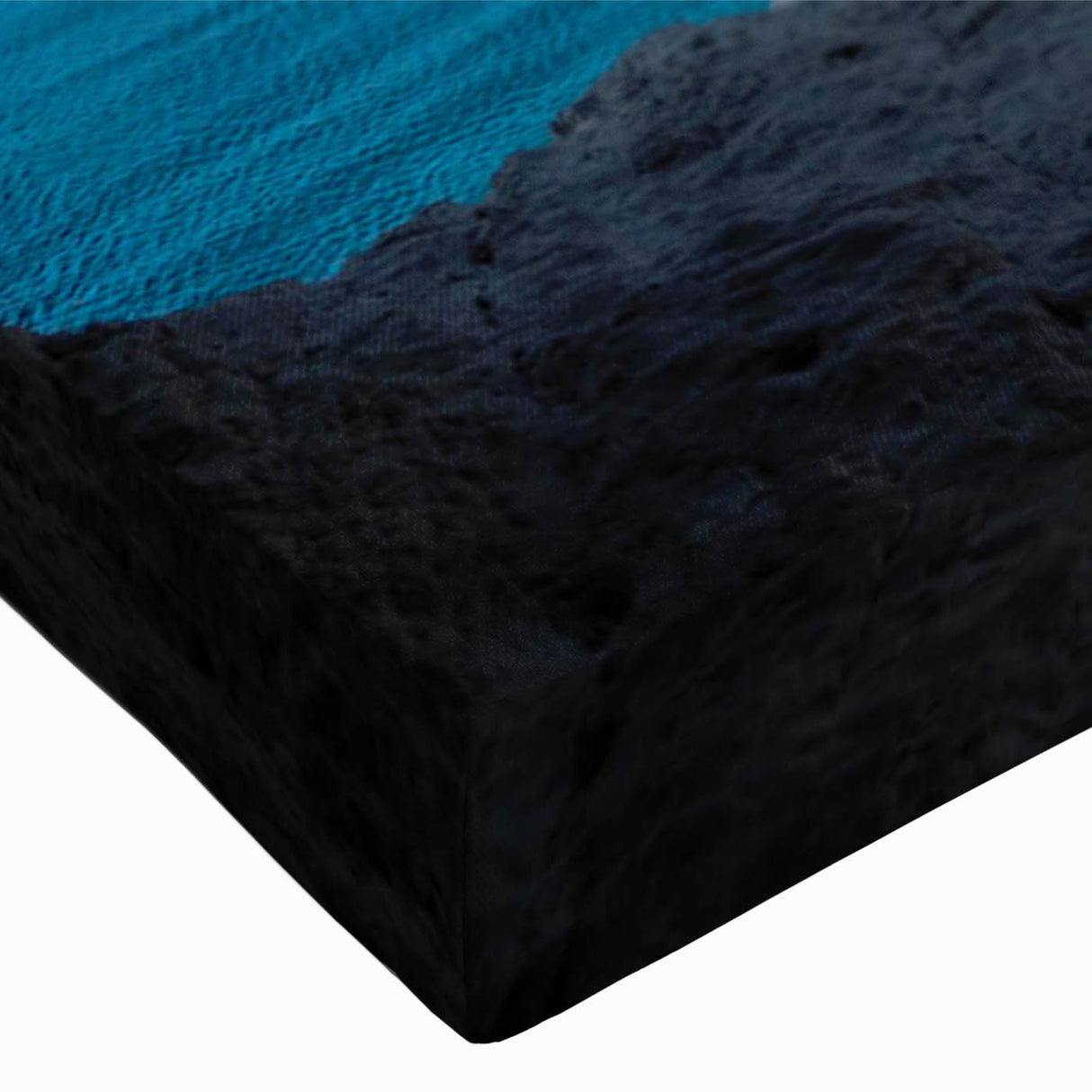 Close-up of a stretched canvas showcasing a vibrant landscape cave design, featuring rich colors and intricate patterns, ideal for modern home decor.