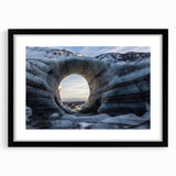 Framed wall art featuring a stunning landscape design with cave motifs, presented in a sleek black frame and a white mat, ideal for modern home decor.