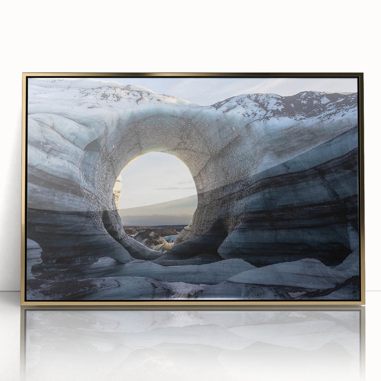 Framed wall art featuring a stunning landscape design with intricate cave motifs, accented by a gold frame; perfect for modern home decor and artistic expression.