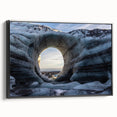 Framed canvas wall art showcasing a dramatic cave landscape design with rich colors and intricate details, presented in a sleek black frame, ideal for modern decor.