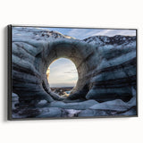 Framed canvas wall art showcasing a dramatic cave landscape design with rich colors and intricate details, presented in a sleek black frame, ideal for modern decor.