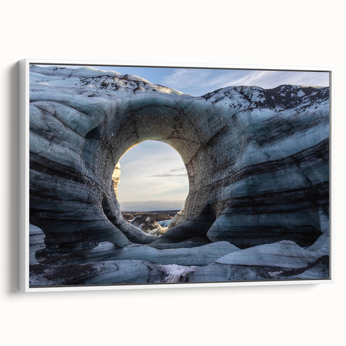Framed canvas wall art showcasing a stunning landscape design featuring caves and natural formations, displayed from a white side view, ideal for home decor.