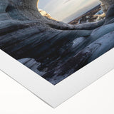 Rolled canvas artwork showcasing a vibrant abstract landscape with cave motifs, featuring rich colors and intricate textures, perfect for modern home decor.