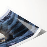 Vibrant rolled print showcasing an abstract landscape design with earthy tones and intricate cave patterns, perfect for modern home decor or gallery walls.