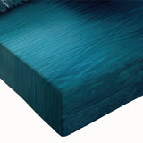 Close-up of a stretched canvas wall art piece showcasing a vibrant landscape with cave designs, featuring rich colors and intricate patterns, ideal for home decor.