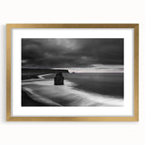 Framed wall art showcasing a breathtaking landscape of rugged cliffs with vibrant colors, accented by a gold mat, perfect for enhancing home decor aesthetics.