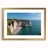 Framed wall art showcasing a stunning cliff landscape design with vibrant colors and a golden mat, perfect for enhancing home decor aesthetics.