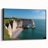 Framed canvas wall art showcasing a dramatic cliff landscape in vibrant colors, featuring black framing for a modern touch, ideal for home decor.