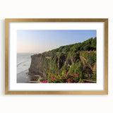 Elegant gold-framed wall art showcasing a stunning landscape of cliffs and serene nature, perfect for enhancing home decor with a touch of sophistication and tranquility.