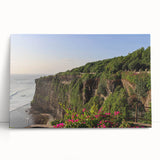 Stretched canvas wall art showcasing a vibrant landscape of cliffs in rich earth tones, elegantly leaning against a wall, ideal for modern home decor.