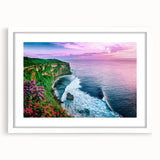 Framed wall art featuring a stunning landscape of cliffs, showcasing vibrant colors and intricate details, presented in a white mat for a modern aesthetic.