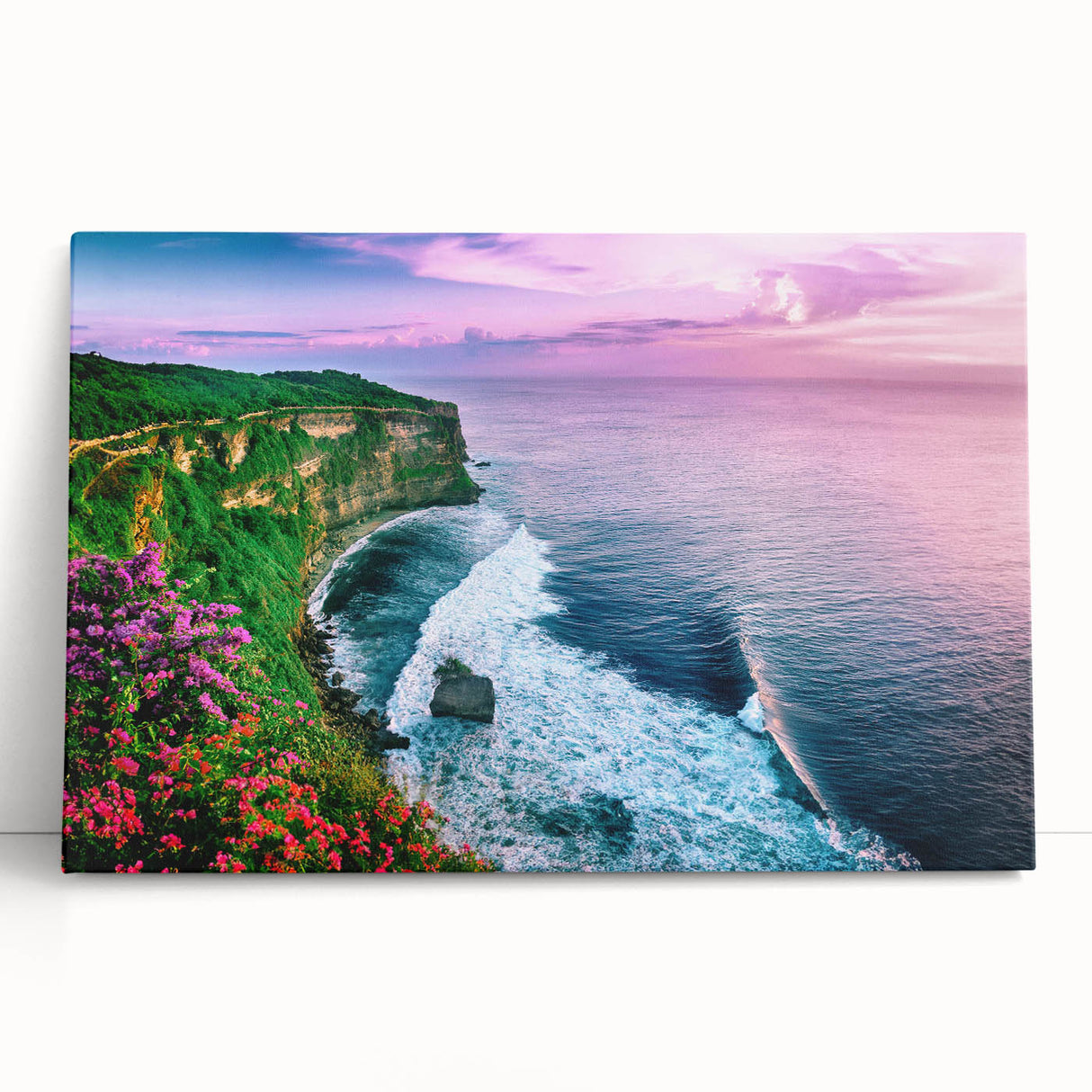 Stretched canvas wall art featuring a serene landscape of cliffs and ocean waves, showcasing earthy tones of blue and brown, perfect for coastal home decor.