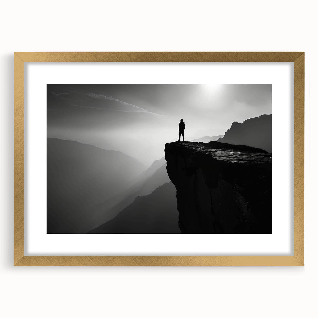 Framed wall art featuring a serene landscape of cliffs and mountains, with a gold frame and mat, ideal for enhancing modern home decor with natural beauty.