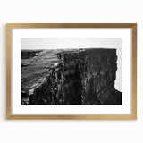 Framed gold wall art featuring a stunning landscape of cliffs, designed for elegant home decor. The matte finish enhances the artwork's vibrant colors and details. Perfect for adding sophistication to any living space or gallery wall.