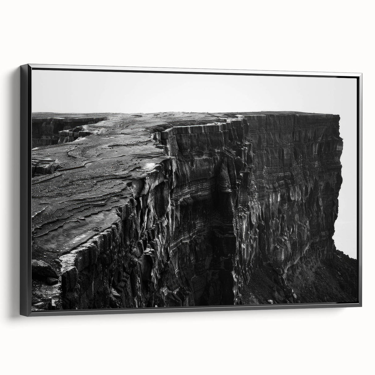 Framed canvas wall art showcasing a stunning landscape of cliffs, featuring earthy tones and intricate details, ideal for enhancing modern home decor.