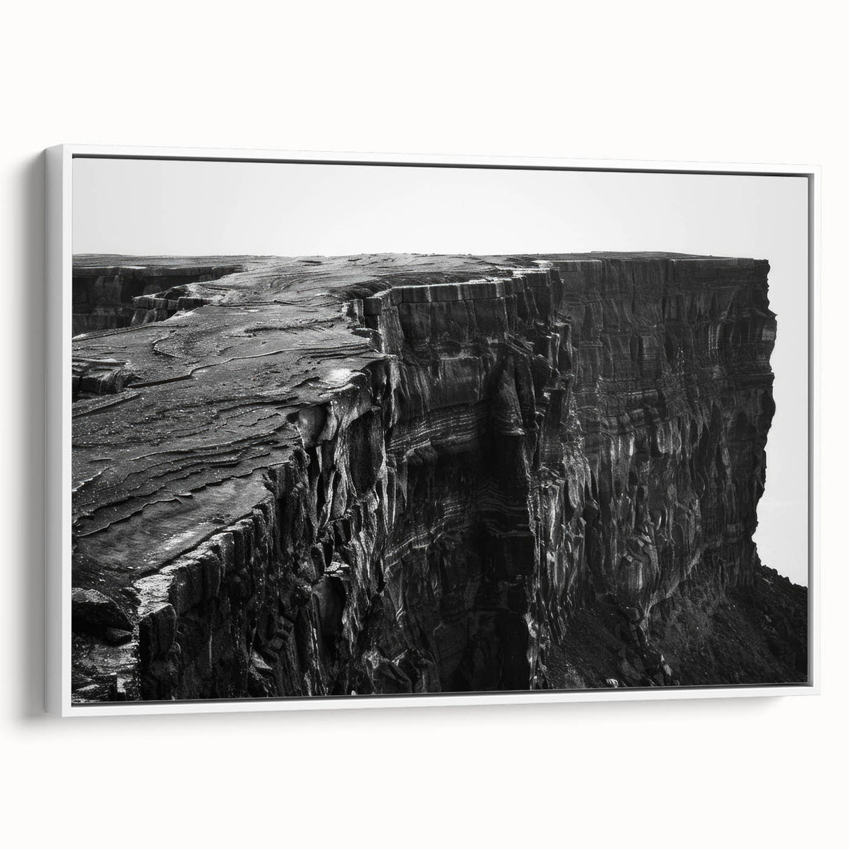 Framed canvas wall art showcasing a stunning landscape of cliffs, featuring vibrant colors and intricate details, ideal for enhancing any modern home decor.