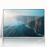 Framed acrylic wall art featuring a vibrant cliff landscape design with rich colors, displayed in a modern white frame, perfect for home decor enhancement.